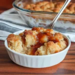this is an image of a dessert with powdered sugar on top and the words, snickkerdoodle cobbler above it