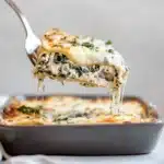 creamy spinach mushroom lasagna with cheese and herbs