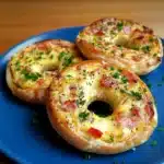 this is an image of stuffed bagels with ham and cheese on them in the shape of pretzels